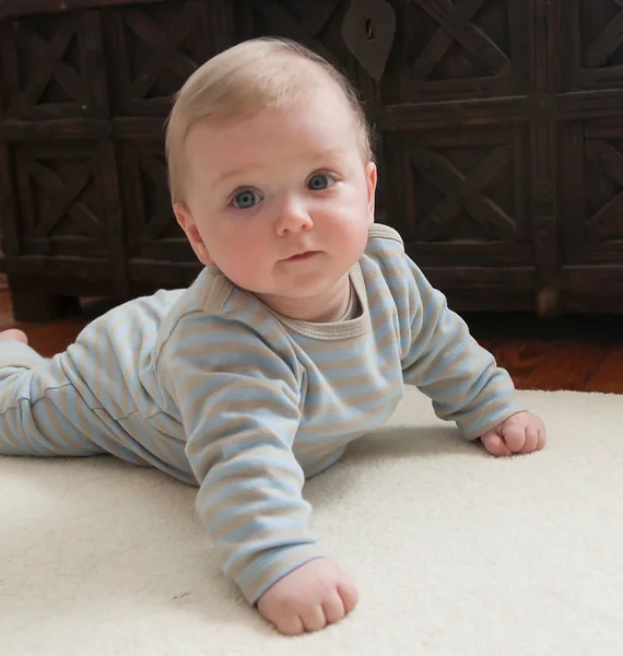 Baby Sebastian smiling for a family portrait