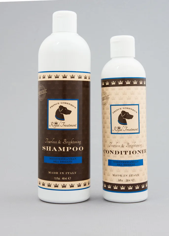 Royal Treatment shampoo and conditioner bottles photographed on a clean background